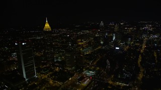 4.8K aerial stock footage flying by skyscrapers toward downtown, Midtown Atlanta, Georgia, night Aerial Stock Footage | AX41_074E