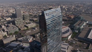 4K aerial stock footage flying by the top of The Ritz-Carlton, Downtown Los Angeles, California Aerial Stock Footage | AX43_020