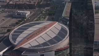 AX43_029 - 4K aerial stock footage flying by Staples Center and the top of the Ritz-Carlton Hotel, Downtown Los Angeles, California