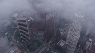 4K aerial stock footage circling above Downtown Los Angeles skyscrapers, California, twilight Aerial Stock Footage | AX44_039