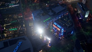 AX44_064 - 4K aerial stock footage of a bird's eye of LA Live, Downtown Los Angeles, twilight