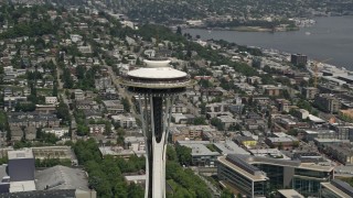 5K aerial stock footage approach and flyby the iconic Space Needle towering over the city, Downtown Seattle, Washington Aerial Stock Footage | AX45_053E