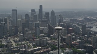 5K aerial stock footage orbiting top of the Space Needle to reveal the Downtown Seattle skyline, Washington Aerial Stock Footage | AX45_055