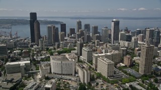 5K aerial stock footage flying over Seattle University campus to approach Downtown Seattle, Washington Aerial Stock Footage | AX45_085E