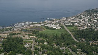 5K aerial stock footage of approaching office buildings and piers in Edmonds, Washington Aerial Stock Footage | AX45_121