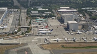 5K aerial stock footage of airliners parked at Paine Field, Everett, Washington Aerial Stock Footage | AX45_134