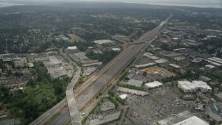 5K aerial stock footage flyby Interstate 5 with light traffic by shopping centers, Lynnwood, Washington Aerial Stock Footage | AX46_010