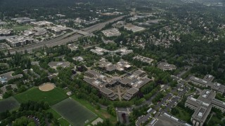 5K aerial stock footage reverse view of office buildings at the Microsoft Headquarters campus, Redmond, Washington Aerial Stock Footage | AX46_037