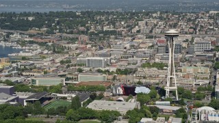 AX47_049 - 5K aerial stock footage of Memorial Stadium, Museum of Pop Culture, and the Space Needle in Downtown Seattle, Washington