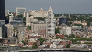 5K aerial stock footage flyby Smith Tower and city buildings in Downtown Seattle, Washington Aerial Stock Footage | AX47_122