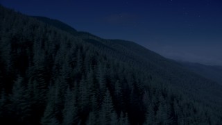 4K day for night color corrected aerial stock footage of mountain slopes covered with evergreen trees in the Cascade Range, Washington Aerial Stock Footage | AX48_060_DFN