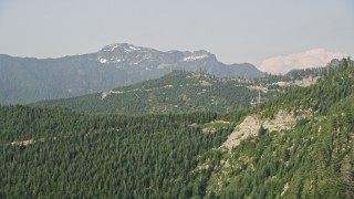 5K aerial stock footage flyby evergreen trees on the slope of a mountain ridge in the Cascade Range, Washington Aerial Stock Footage | AX48_064