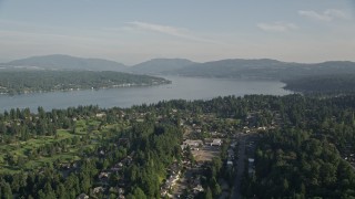 5K aerial stock footage of Lake Sammamish seen from suburban neighborhoods in Bellevue, Washington Aerial Stock Footage | AX49_034