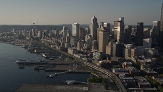 5K aerial stock footage approach Ferry Terminal, and the Central Waterfront, Downtown Seattle, Washington Aerial Stock Footage | AX49_084