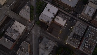 5K aerial stock footage of bird's eye view of city streets in Downtown Seattle, Washington at sunset Aerial Stock Footage | AX50_058