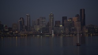 5K aerial stock footage orbit sailboat to reveal Downtown Seattle skyline, Washington, twilight Aerial Stock Footage | AX50_095