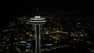 5K aerial stock footage orbit top of the Seattle Space Needle at night, Downtown Seattle, Washington Aerial Stock Footage | AX51_028E