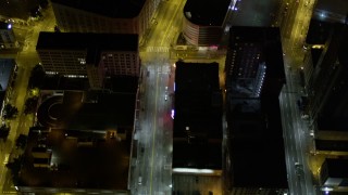 5K aerial stock footage of bird's eye view of 3rd Avenue through Downtown Seattle, Washington, night Aerial Stock Footage | AX51_058E