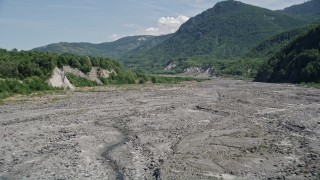 AX52_035E - 5K aerial stock footage of low flight over North Fork Toutle River sediment, Washington