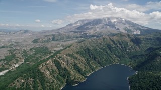 AX52_042E - 5K aerial stock footage fly over Castle Lake to approach Mount St. Helens, Washington