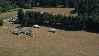 5K aerial stock footage of small barn next to a farmhouse in La Center, Washington Aerial Stock Footage | AX52_080