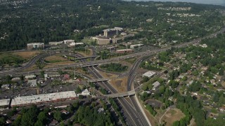 5K aerial stock footage fly over highways toward a medical center, Southwest Portland, Oregon Aerial Stock Footage | AX53_008