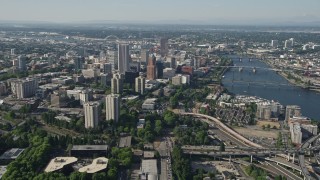 AX53_031E - 5K aerial stock footage video fly over city skyscrapers and high-rises, Downtown Portland, Oregon