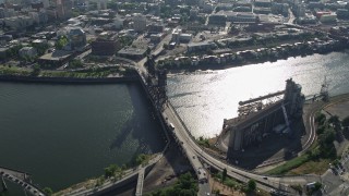 5K aerial stock footage tilt from Steel Bridge to reveal and approach Downtown Portland, Oregon Aerial Stock Footage | AX53_039E