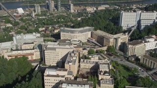 5K aerial stock footage of flying by Oregon Health and Science University, Portland, Oregon Aerial Stock Footage | AX53_068