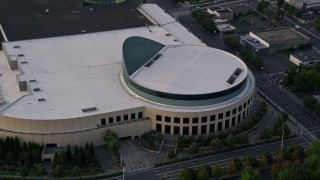 5K aerial stock footage of approaching office buildings, Oregon Convention Center, Lloyd Center, Northeast Portland, Oregon, sunset Aerial Stock Footage | AX54_045