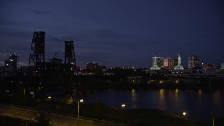 5K aerial stock footage approach lit spires atop the Oregon Convention Center, Lloyd Center, Northeast Portland, Oregon, twilight Aerial Stock Footage | AX55_002E