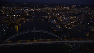 5K aerial stock footage of orbiting the Fremont Bridge, revealing Downtown Portland, Oregon, twilight Aerial Stock Footage | AX55_007E