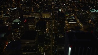 5K aerial stock footage follow SW 5th Avenue to reveal US Bancorp Tower and Broadway Bridge, Downtown Portland, Oregon, night Aerial Stock Footage | AX55_033E