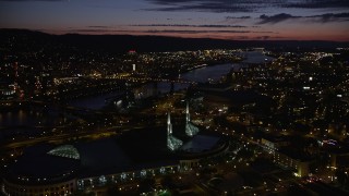 5K aerial stock footage approach Oregon Convention Center, Broadway Bridge, Willamette River, Lloyd District, Northeast Portland, Oregon, night Aerial Stock Footage | AX55_037