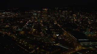 5K aerial stock footage of approaching US Bancorp Tower from Union Station, Downtown Portland, Oregon, night Aerial Stock Footage | AX55_052