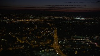 5K aerial stock footage of approaching office buildings and wide streets, Beaverton, Oregon, night Aerial Stock Footage | AX55_068