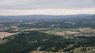 5K aerial stock footage of passing farms and crop fields in Banks, Oregon Aerial Stock Footage | AX56_013