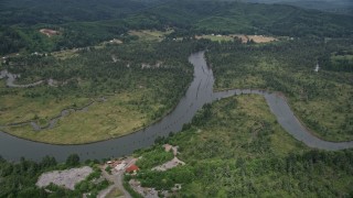 5K aerial stock footage pan across the Willapa River in Raymond, Washington Aerial Stock Footage | AX56_176