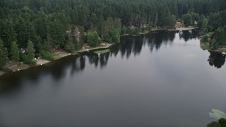 5K aerial  video of lakeside homes by Stansberry Lake in Gig Harbor, Washington Aerial Stock Footage | AX58_036