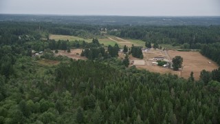 5K aerial stock footage approach a small farm and fields in Gig Harbor, Washington Aerial Stock Footage | AX58_042