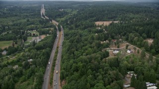 5K aerial stock footage fly by State Route 16 and a couple of upscale homes in Olalla, Washington Aerial Stock Footage | AX58_047