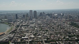 5K aerial stock footage fly over the French Quarter to approach Downtown New Orleans, Louisiana Aerial Stock Footage | AX59_005