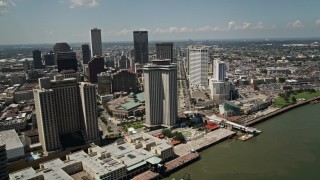 5K aerial stock footage of Hilton New Orleans and World Trade Center building in Downtown New Orleans, Louisiana Aerial Stock Footage | AX59_014