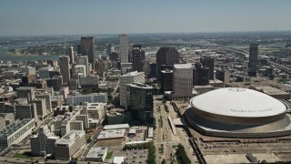 5K aerial stock footage approach Downtown New Orleans skyscrapers and Mercedes-Benz Superdome, Louisiana Aerial Stock Footage | AX59_021E