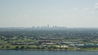 5K aerial stock footage of Downtown New Orleans skyline seen from Lake Pontchartrain, Louisiana Aerial Stock Footage | AX60_001