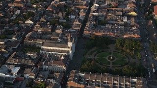 AX61_014 - 5K aerial stock footage approach St. Louis Cathedral and Jackson Square at sunset, New Orleans, Louisiana