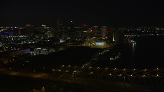 5K aerial stock footage of Crescent City Connection Bridge and Downtown New Orleans, Louisiana at night Aerial Stock Footage | AX62_017