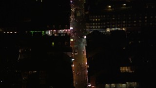 5K aerial stock footage of bird's eye view of a crowd on Bourbon Street in the French Quarter at night, New Orleans, Louisiana Aerial Stock Footage | AX62_022