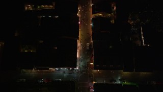 5K aerial stock footage bird's eye of small crowd and tourists on Bourbon Street in the French Quarter at night, New Orleans, Louisiana Aerial Stock Footage | AX62_028