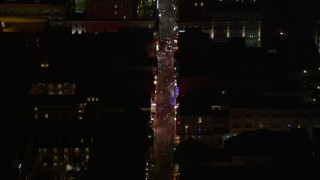 AX62_042E - 5K aerial stock footage of bird's eye of tourists on Bourbon Street in the French Quarter at night, New Orleans, Louisiana